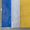 A ráfia azul tecida Pp colorida do saco do polipropileno despede o material novo
